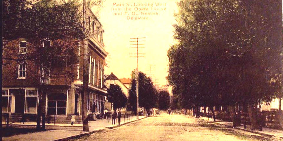 MAIN STREET IN NEWARK DELAWARE AT THE OLD OPERA HOUSE CIRCA 1900