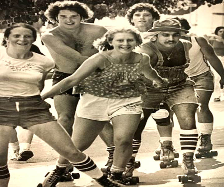ROLLER SKATERS DURING THE CRAZE OF THE 70s in downtown Newark Delaware 1979