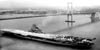 Ticonderoga Air Craft Carrier passes beneath Delaware Memorial Bridge in 1955