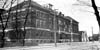 WILMINGTON HIGH SCHOOL WITH TROLLEY TRACKS ON DELAWARE AVENUE IN WILMINGTON DELAWARE CIRCA